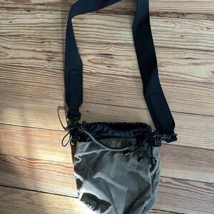 Chic Olive Crossbody Bag with Black Strap